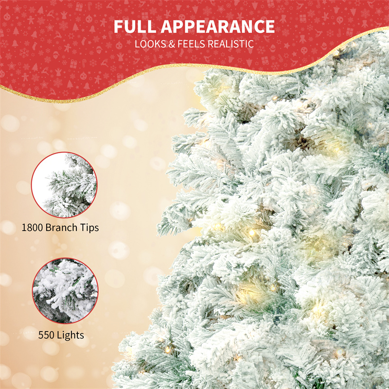 Snow-flocked white Christmas tree with warm-white lights